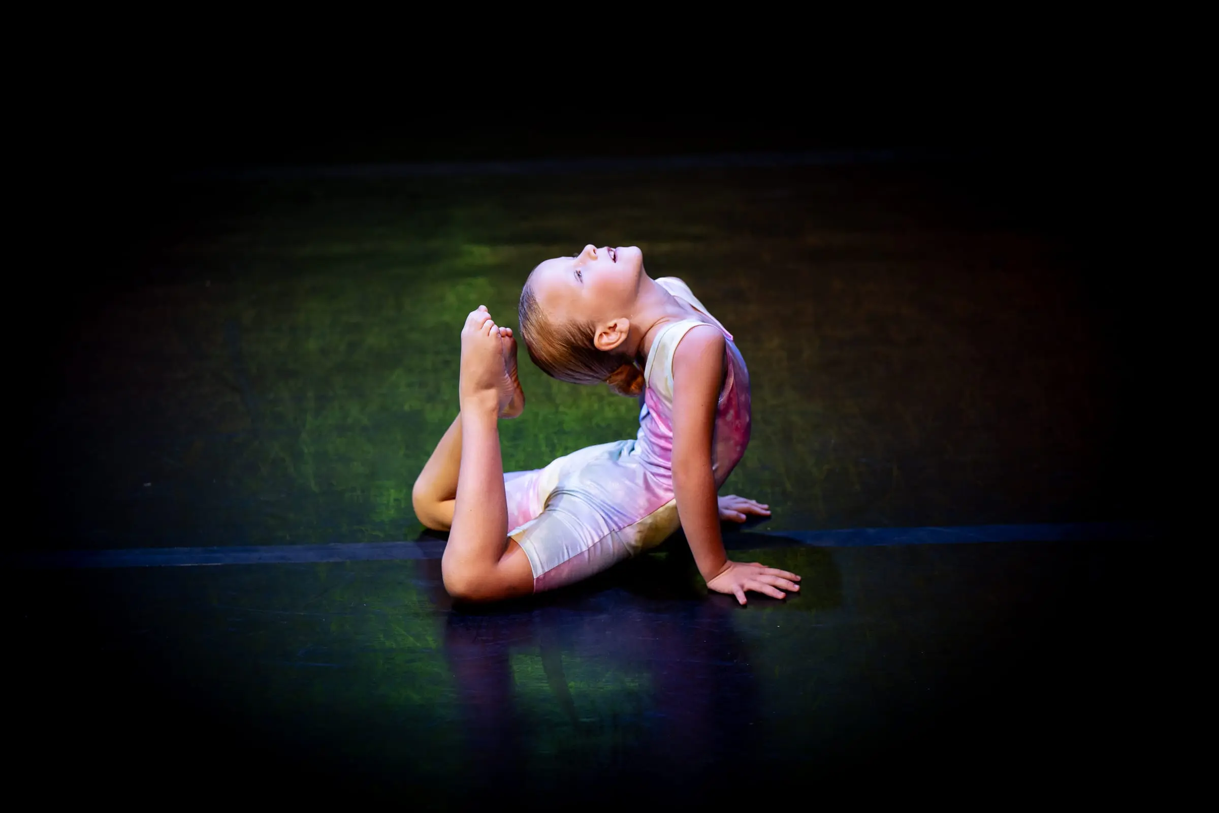 Acro and gymnastics students training at Dancemania Witney