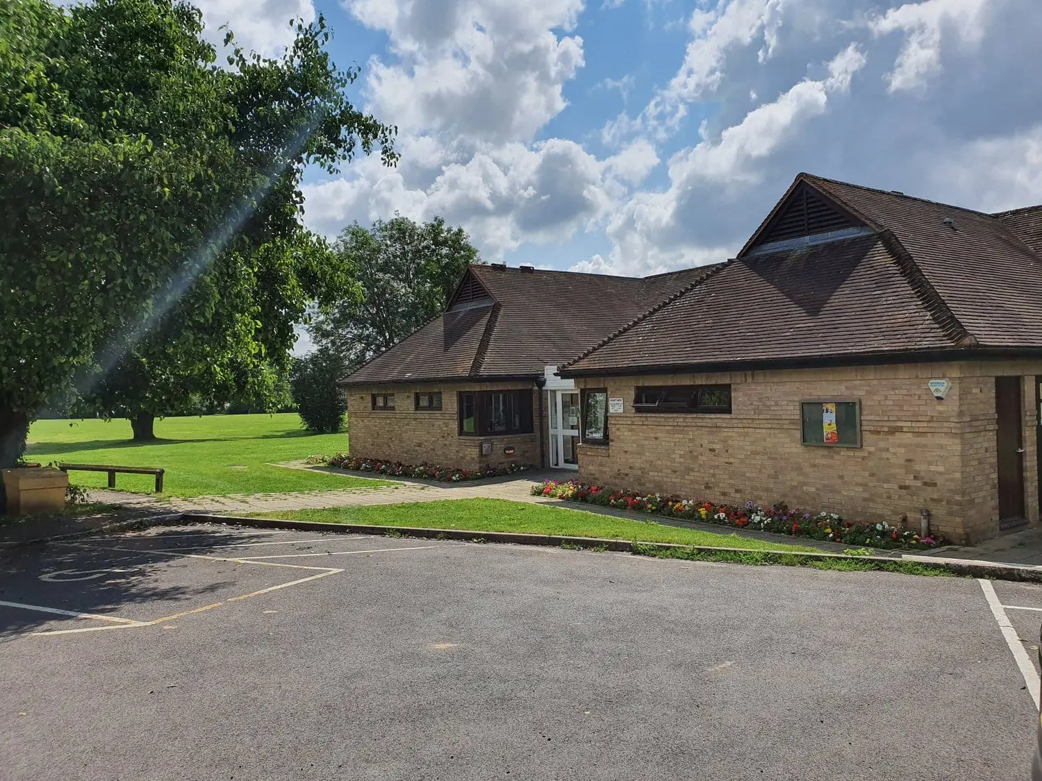 Burwell Hall, a single-storey brick hall with its own car park in Witney