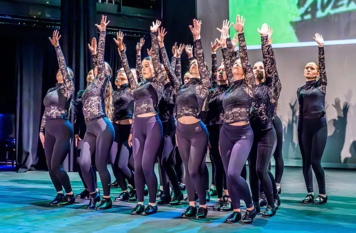 The Dancemania competition and performance team on stage