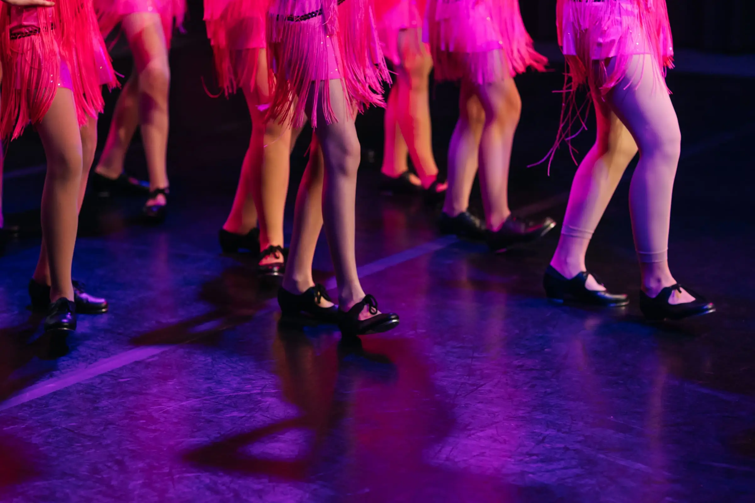 Dancemania students working on tap technique in class